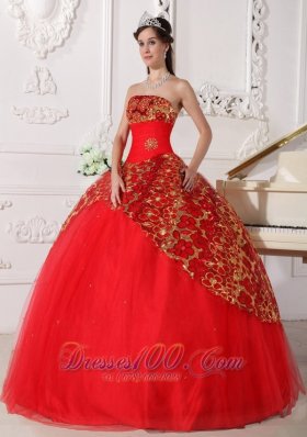 Red and gold quinceanera dresses